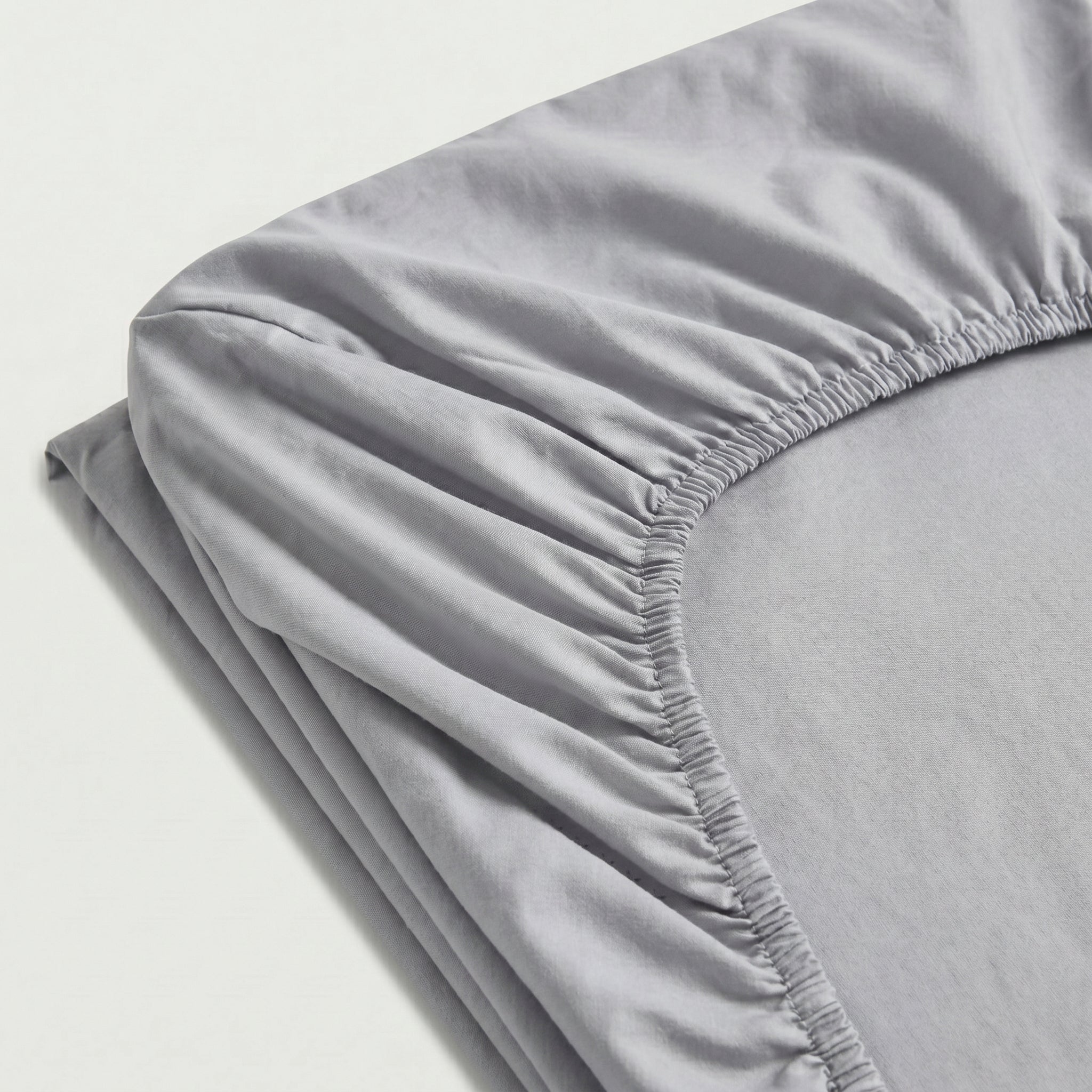 drap-housse uni en percale de coton frais et confortable avec maintien optimal