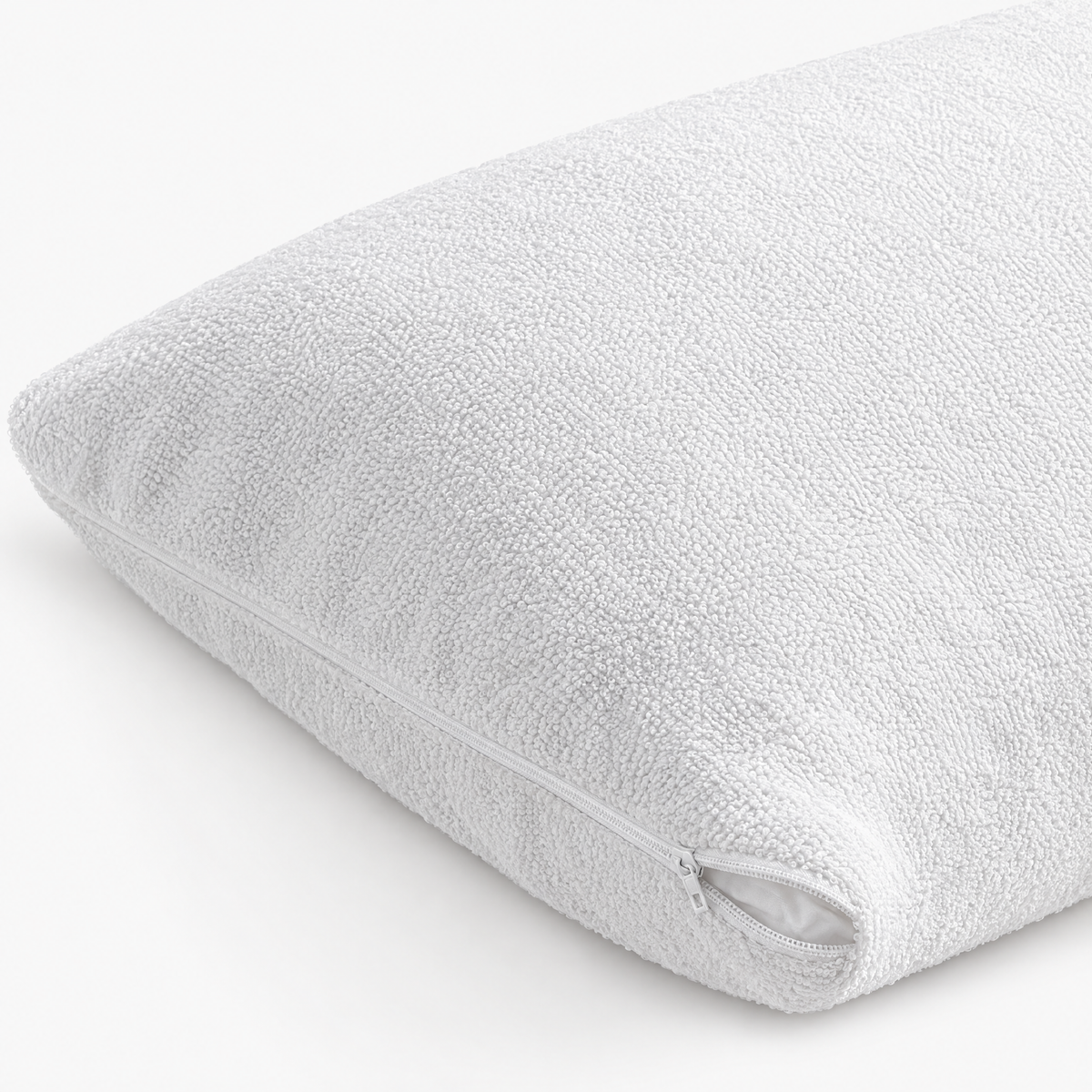 Détail de l'éponge bouclette du protège-oreiller imperméable et de sa fermeture éclair