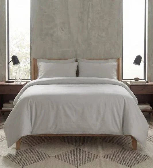 drap-housse en percale de coton 100 fils/cm² uni avec bonnet ajusté et texture lisse, fraîcheur naturelle et maintien impeccable