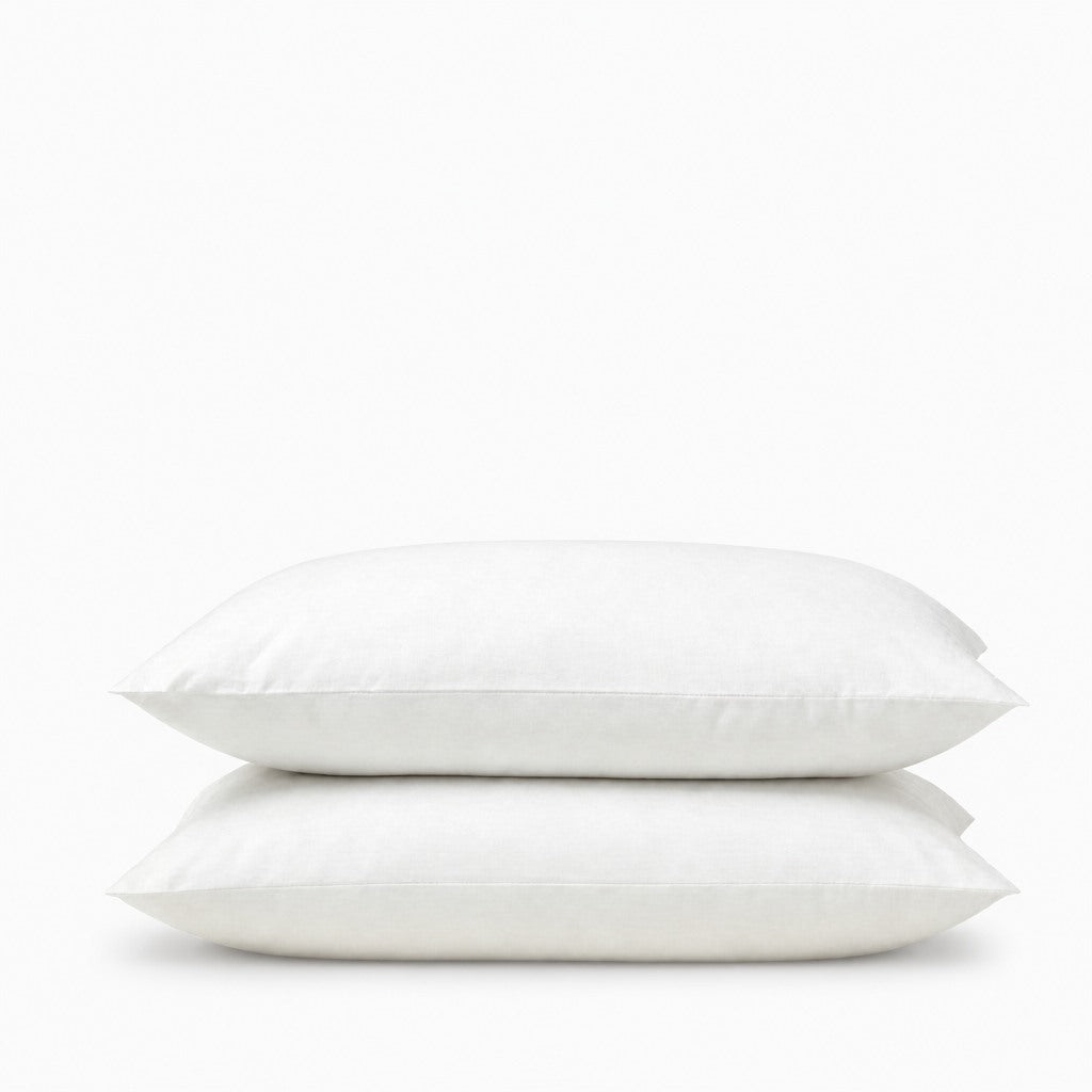 Deux taies d'oreiller en percale de coton 100 fils/cm2, texture lisse et respirante, style épuré et élégant
