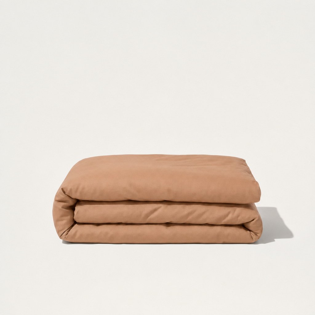 Housse de couette unie en percale de coton, texture lisse et fraîche, élégance sobre et durable